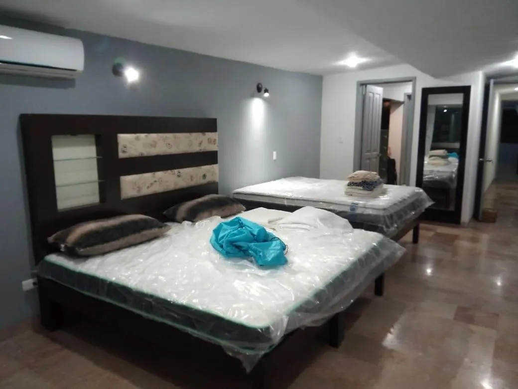 Large Penthouse On Lagoon, Fantastic Views, Across From Beach Cancun Hostel